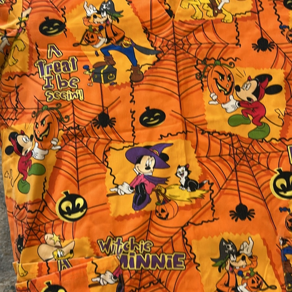 Disney Orange Halloween Scrub Top size medium gently used